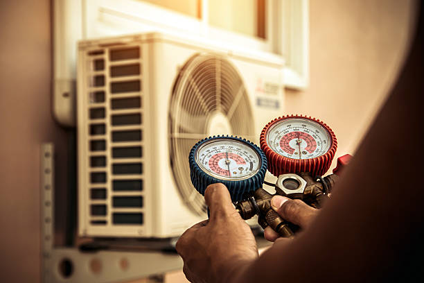 Professional Heat Pump Repair technician working in Clarksville, TX